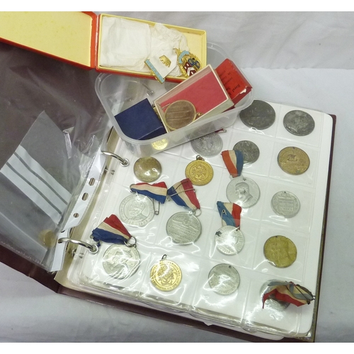 178 - An album of royal interest and other commemorative medals; various badges etc.