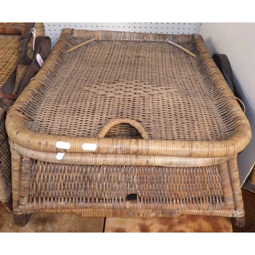 63 - A pair of vintage wicker fishing chairs, the folding backs held by leather straps, af