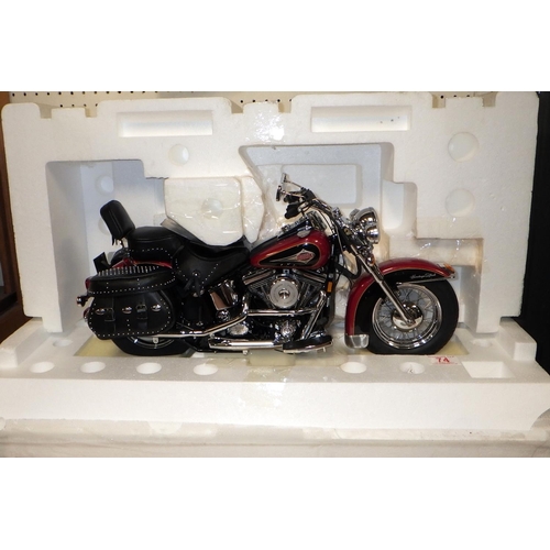 74 - A Franklin Mint Harley Davidson Heritage Softail Classic model, missing outer sleeve