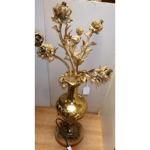 123 - A pair of large gilt heavy metal floral table Lamps 66 & 89cm tall