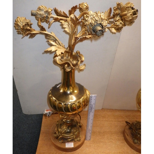 123 - A pair of large gilt heavy metal floral table Lamps 66 & 89cm tall