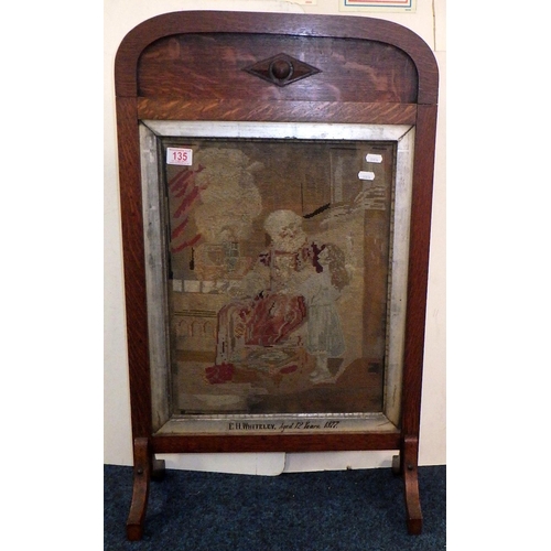 135 - A 19thC embroidery by E H whitteley 1877, converted into a firescreen