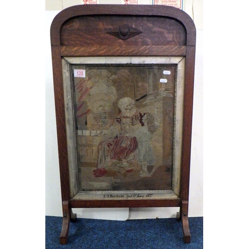 135 - A 19thC embroidery by E H whitteley 1877, converted into a firescreen