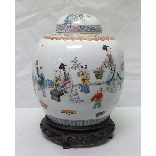 298 - A Chinese famille rose ginger jar decorated with scenes of children playing.  Approximately 23cm tal... 