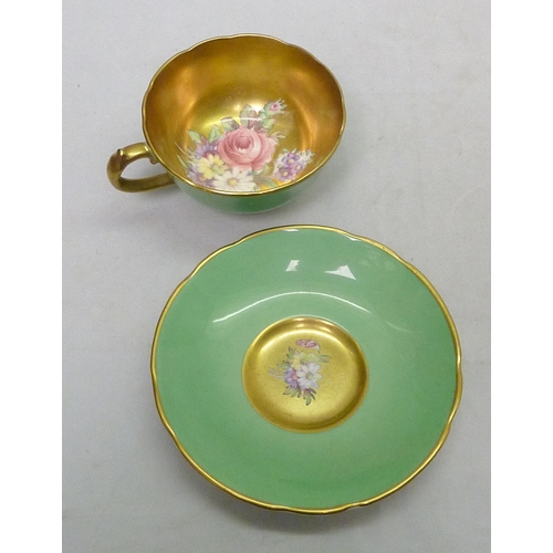 300 - Six matching Minton coffee cans and saucers, gilt decoration over a pink/red ground; a Paragon coffe... 