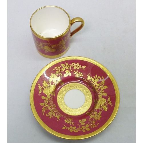 300 - Six matching Minton coffee cans and saucers, gilt decoration over a pink/red ground; a Paragon coffe... 