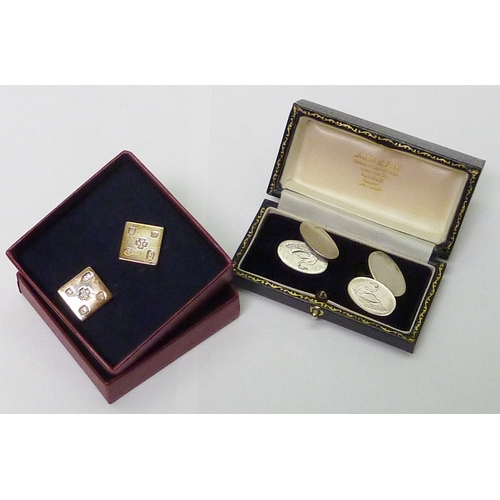 308 - A pair of silver chain-link cufflinks, one head engraved with a swan motif.  John R Fox, London 1990... 