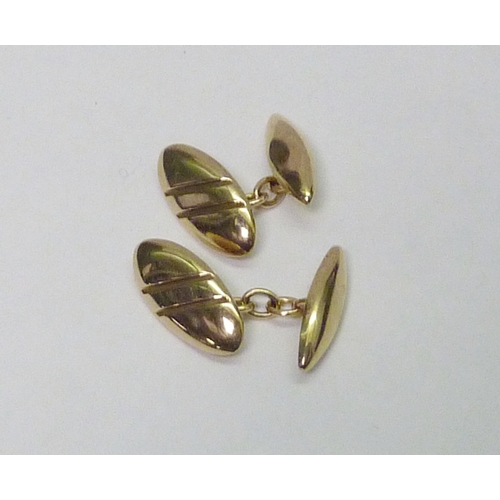 311 - A pair of Allan Christensen Design chain-link cufflinks, 9ct gold, London 1994.  Heads 23 x 10mm and... 