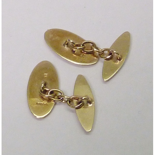 311 - A pair of Allan Christensen Design chain-link cufflinks, 9ct gold, London 1994.  Heads 23 x 10mm and... 