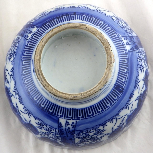 162 - An Oriental blue and white bowl 25cm diameter together with a restored charger (2)