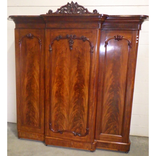 A Victorian mahogany triple wardrobe, 218cm wide, 235cm tall