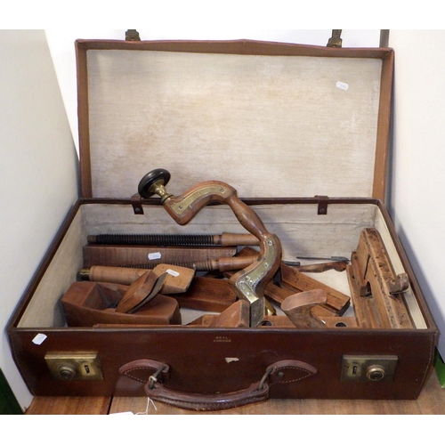 189 - A leather case and contents to inc wood working tools