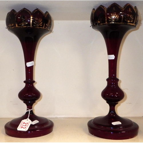 212 - A pair of Victorian red glass lustres 33cm tall