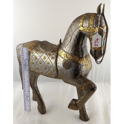 274 - An Oriental gilt and white metal horse 49cm tall