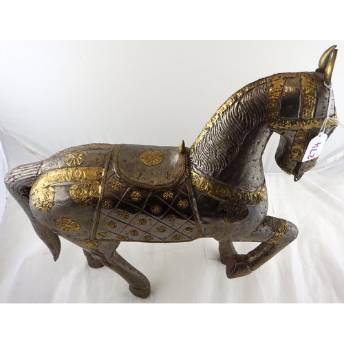 274 - An Oriental gilt and white metal horse 49cm tall