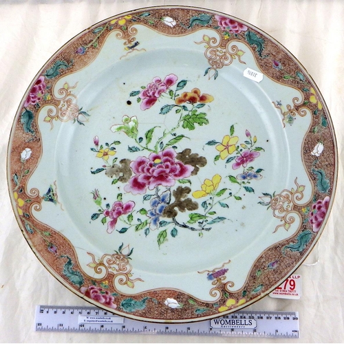 279 - A Chinese famille rose charger / dish decorated with flowers 39cm diameter, AF restored star crack, ... 