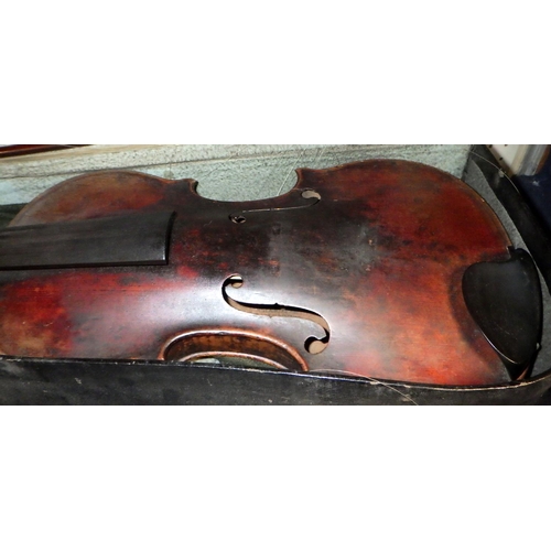 296 - A violin having a two piece back, the interior bearing the impressed mark 