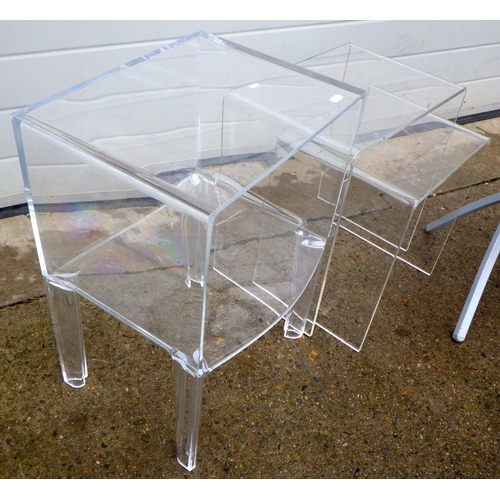 743 - A perspex bedside table, stamped Kartell, small Ghostbuster design, a mirrored wine table, two persp... 