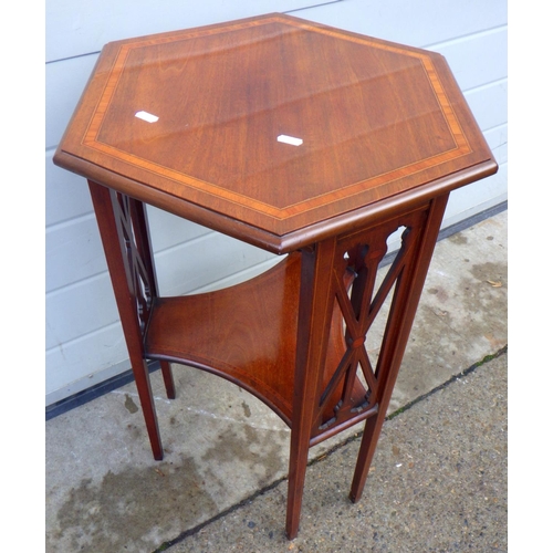 754 - An Edwardian hexagonal mahogany occasional table with banded to, 44cm across