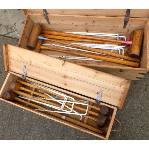 757 - Two boxes of croquet mallets & hoops