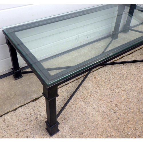 777 - A glass topped rectangular coffee table, 120cm long together with a matching occasional table (2)