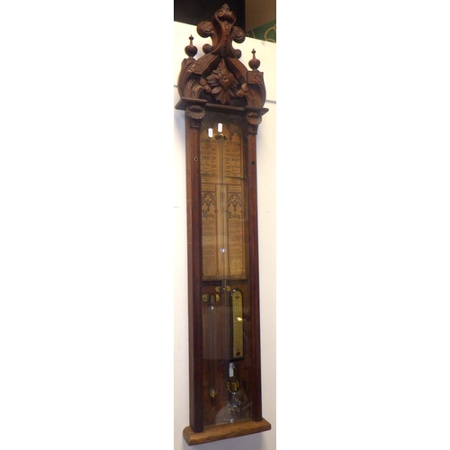 799 - An Admiral Fitzroy carved oak barometer case, lacking mercury