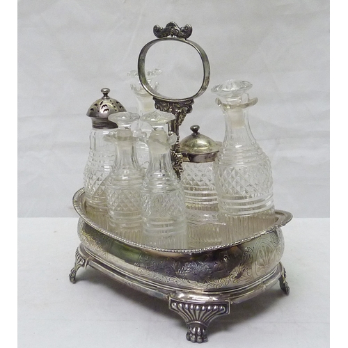 361 - A George III silver and hardwood condiment stand with a part set of cut glass condiments (one lackin... 