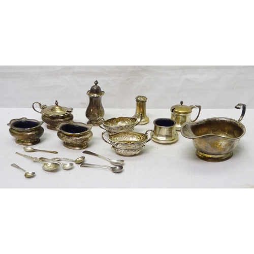 406 - A silver four piece condiment set comprising a mustard pot, two table salts and a pepper pot, with b... 