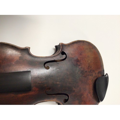 296 - A violin having a two piece back, the interior bearing the impressed mark 