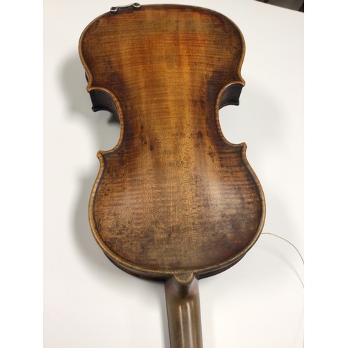 296 - A violin having a two piece back, the interior bearing the impressed mark 