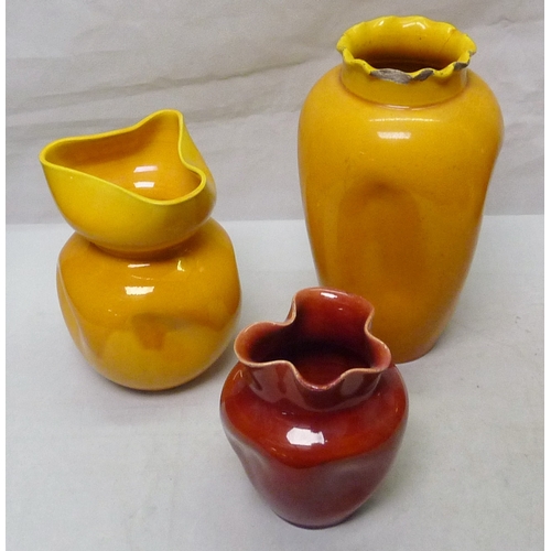 205 - Burmantofts Faience: a tricorn top bulbous vase, 135mm tall; four wavy edge vases; a miniature jardi... 