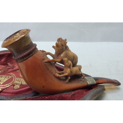 215 - A cased meerschaum pipe; a netsuke, and two other oriental carvings.