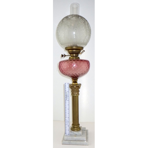 1 - A brass Corinthian column oil lamp 80cm tall