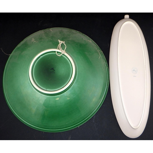 102 - A Poole pottery charger 35cm diameter together with a shallow narrow dish (2)