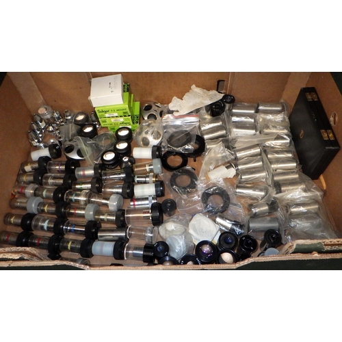 105 - A large qty of mainly Vickers microscope stock, objectives, eye pieces etc, unused