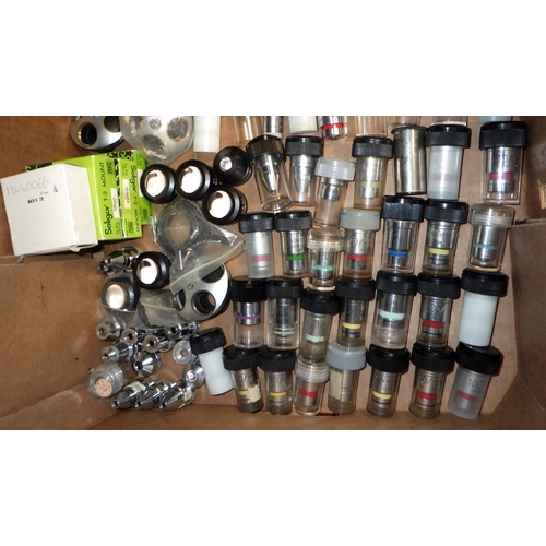 105 - A large qty of mainly Vickers microscope stock, objectives, eye pieces etc, unused