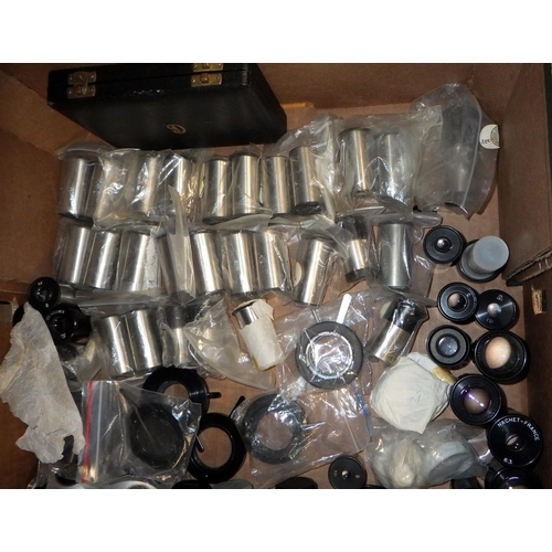 105 - A large qty of mainly Vickers microscope stock, objectives, eye pieces etc, unused