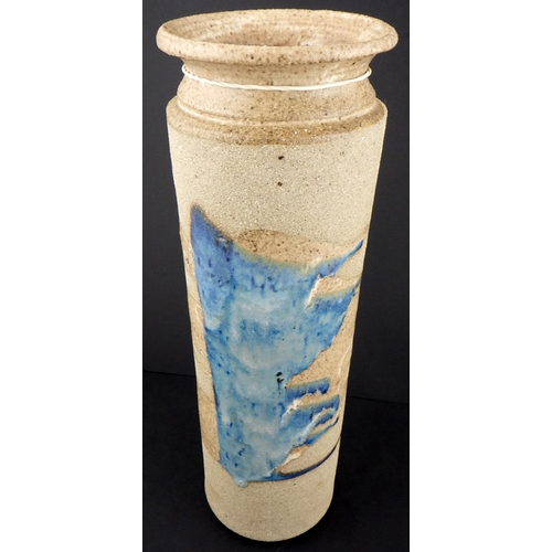 89 - Two Junko Shibe art pottery candlesticks together with a tall cylindrical stuido vase (3)
