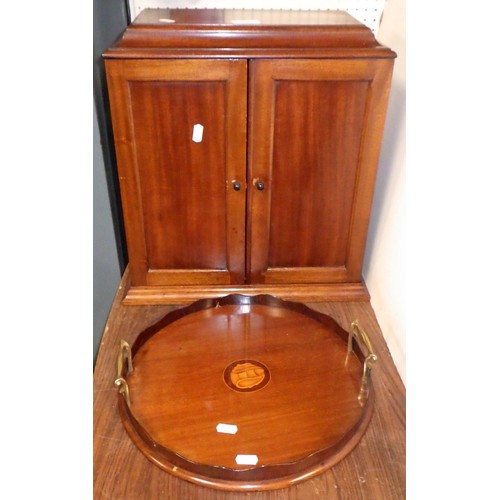 72 - A Edwardian mahogany cupboard together with an inlaid circular tray (2)