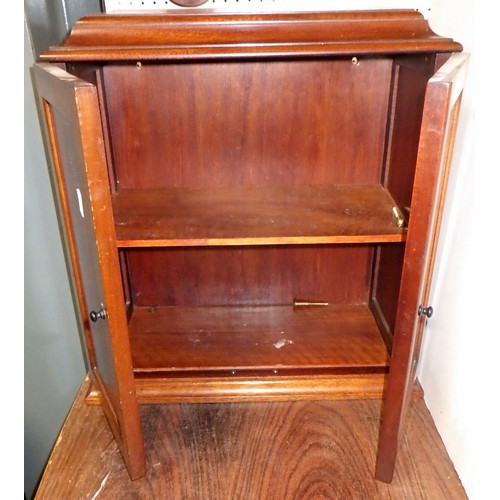 72 - A Edwardian mahogany cupboard together with an inlaid circular tray (2)