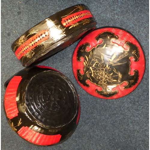 126 - Three Oriental lacquered food / wedding baskets together with a lacquered box