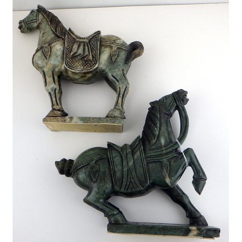 128 - Two Oriental polished stone horses together with a small carved soapstone spill vase (3)
