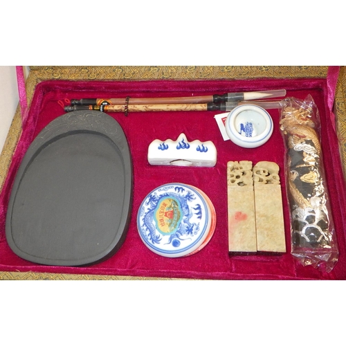 134 - A Chinese ink stone calligraphy set together with a boxed set of brushes and a hardwood box (3)