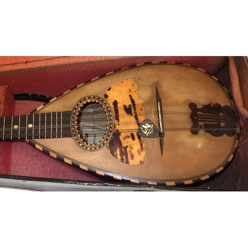 150 - A cased Mandolin af