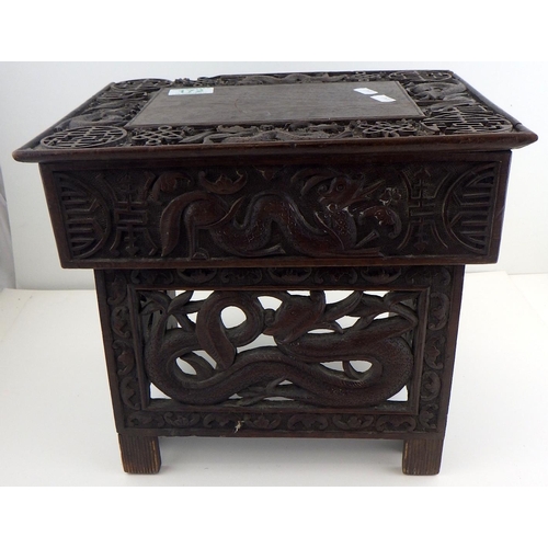 172 - A small Chinese carved hardwood folding table