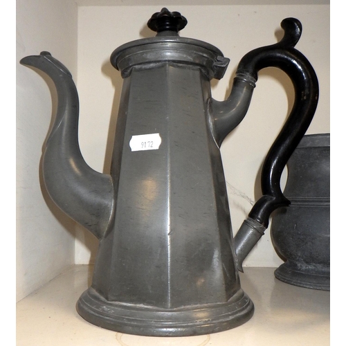 179 - A pewter coffee pot together with two pewter tankards and a tin cannister