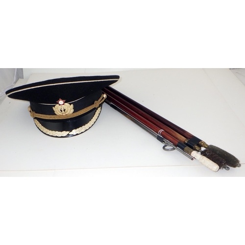 198 - A Russian naval cap together with a shotgun cleaners (2)