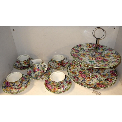 199 - A Midwinter Chintz cakestand together with similar cups, saucers and a milk jug