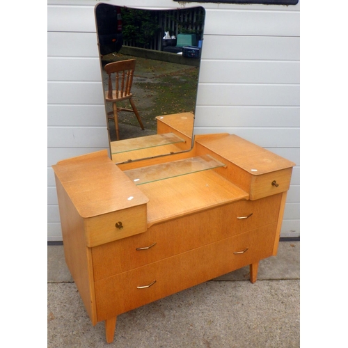 831 - A 1950's dressing table, 101cm wide