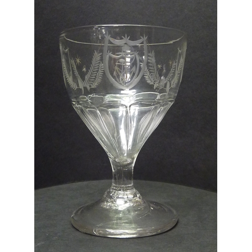 263 - A petal moulded rummer drinking glass having wheel engraved anchor and swag motif decorative frieze.... 